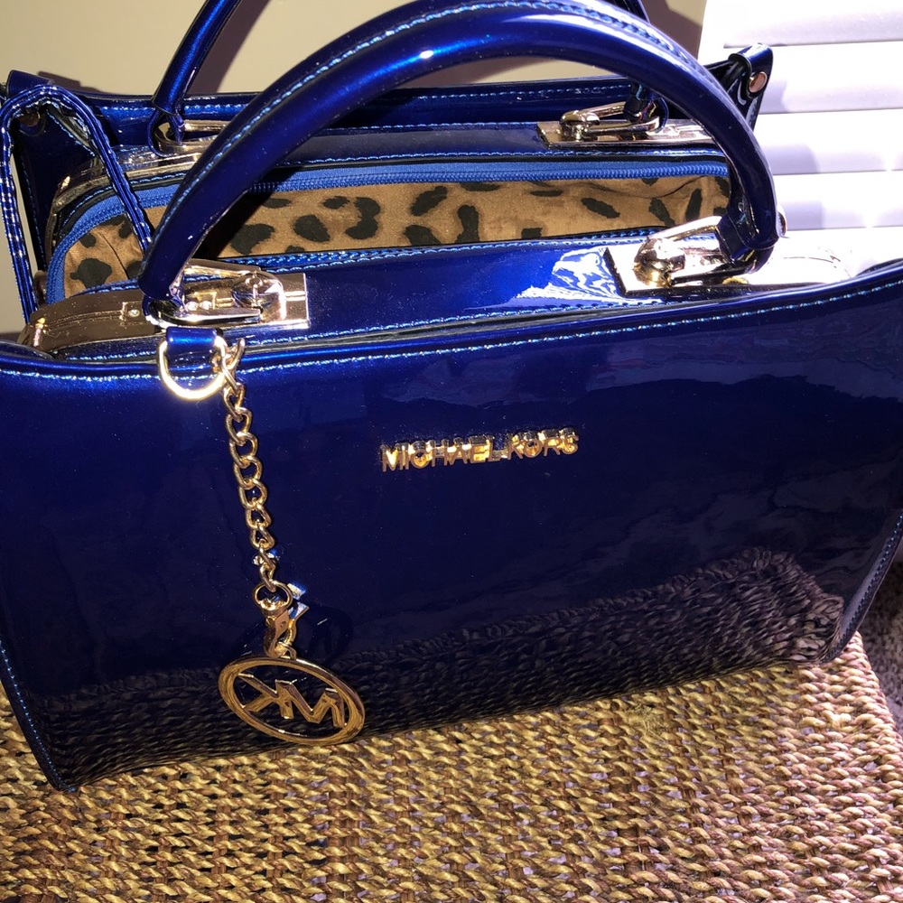 Michael Kors 🦋💙💙Royal Blue Patent leather.